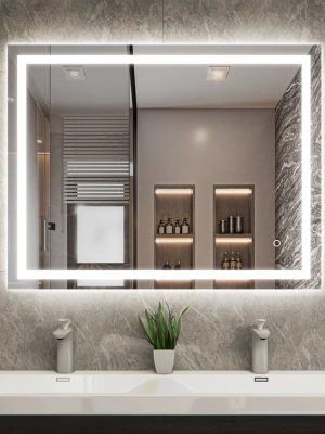 A contemporary bathroom featuring a spacious mirror and dual sinks.